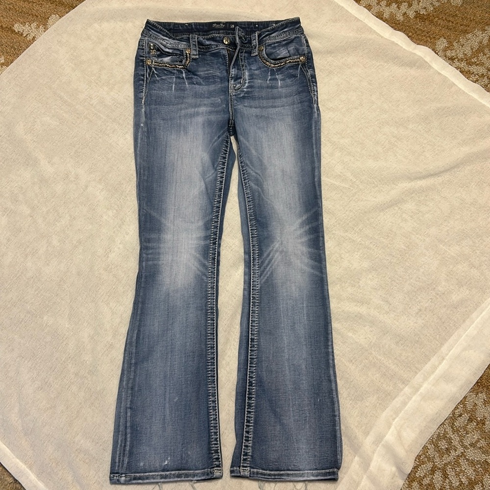 Miss Me jeans boot/flare size 29 fleur de li on back pockets